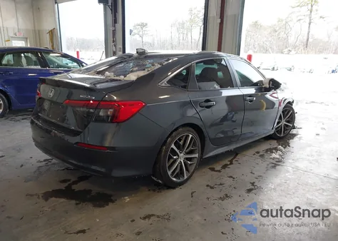 2022 Honda Civic Touring z USA, uszkodzony, nr VIN 2HGFE1F90NH308359